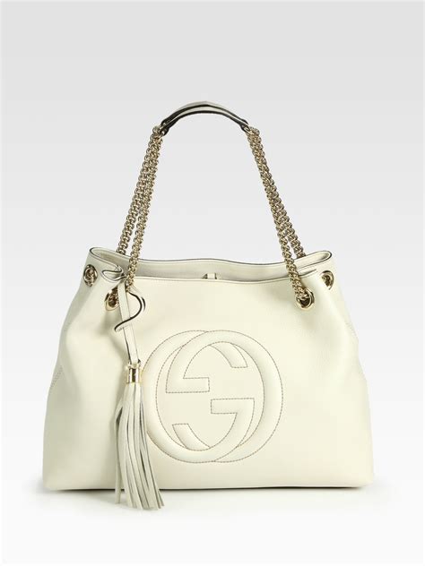 gucci ペアルック|white Gucci bag.